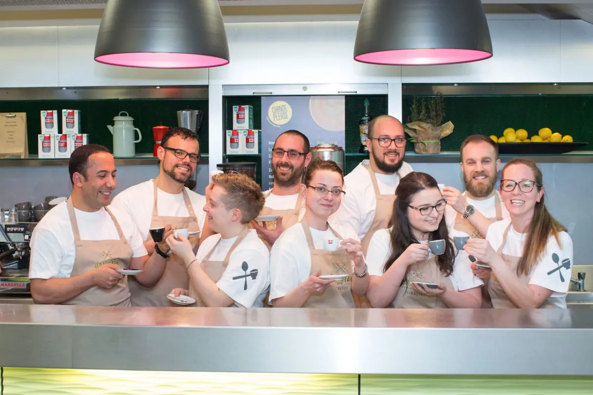 baristas behind the bar