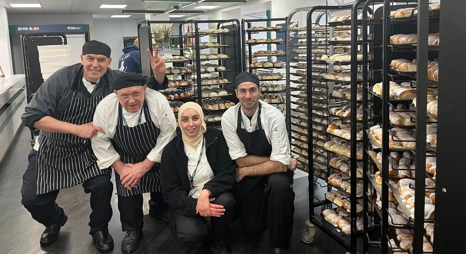 4 chefs in a bakery