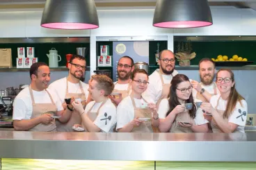 baristas behind the bar